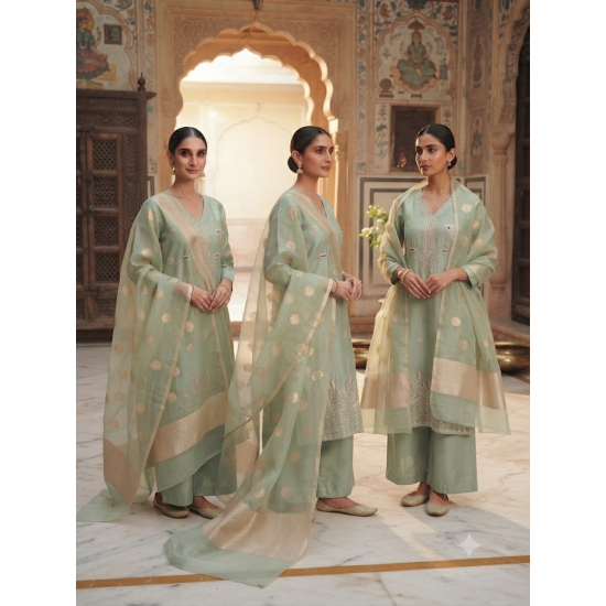 Roman silk blend pattern kurta with lining & paired with palazzo and a delicately embellished dupatta Pista