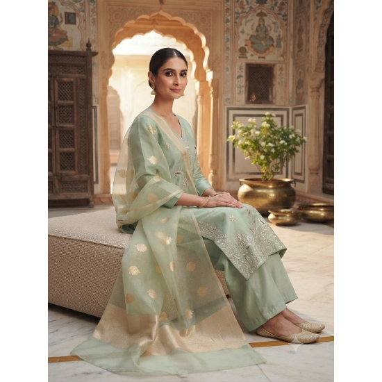 Roman silk blend pattern kurta with lining & paired with palazzo and a delicately embellished dupatta Pista