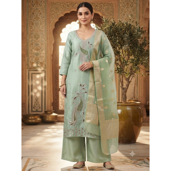Roman silk blend pattern kurta with lining & paired with palazzo and a delicately embellished dupatta Pista