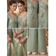 Roman silk blend pattern kurta with lining & paired with palazzo and a delicately embellished dupatta Pista