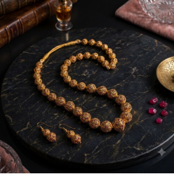 Antique gold-toned Ball necklace with matching filigree drop earrings-Grey