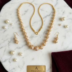 Antique gold-toned Ball necklace with matching filigree drop earrings-White